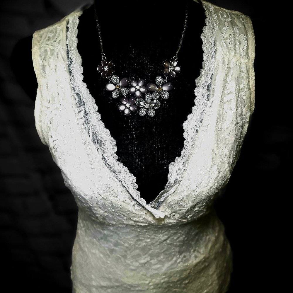 Two things for sale here the cream of light dance and lace antique cream shirt.